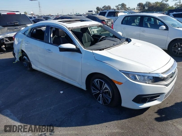 2017 Honda Civic EX-T with VIN 19XFC1E38HE002205, listed as a IAAI auction lot 40891678 with 10,398 mi miles and . Bid and sale history available at DreamBid. Image 1.
