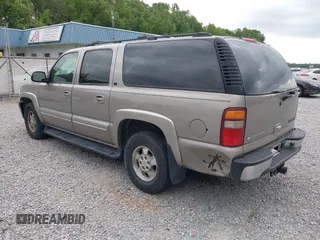 2003 Chevrolet Suburban LT z VIN 1GNEC16Z13J140136, wystawiony jako IAAI lot #42142827 z przebiegiem 252 698 mil mil oraz . Historia ofert i sprzedaży dostępna na DreamBid. Obrazek 3.