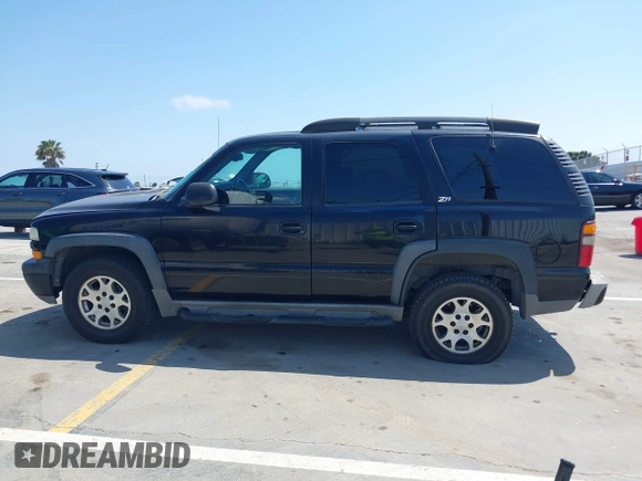 2001 Chevrolet Tahoe LT with VIN 1GNEK13T41R197657, listed as a IAAI auction lot 42164367 with 200,507 mi miles. Bid and sale history available at carsss.com. Image 14.