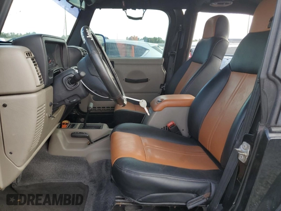 2004 Jeep Wrangler Rubicon with VIN 1J4FA69S54P769356, listed as a Copart auction lot 74089914 with 0 mi miles and Salvage Title. Bid and sale history available at carsss.com. Image 7.