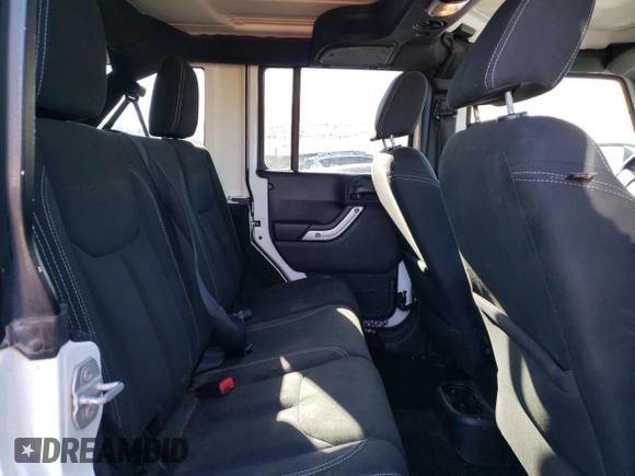 2016 Jeep Wrangler Unlimited 75th Anniversary with VIN 1C4HJWEG3GL185999, listed as a Copart auction lot 42060225 with 112,769 mi miles and Salvage title. Bid and sale history available at DreamBid. Image 10.