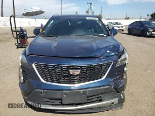 2019 Cadillac XT4 FWD Premium Luxury with VIN 1GYFZCR42KF104457, listed as a Copart auction lot 52783485 with 57,572 mi miles and Salvage title. Bid and sale history available at DreamBid. Image 5.