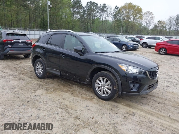 2014 Mazda CX-5 Touring with VIN JM3KE2CY7E0341658, listed as a IAAI auction lot 41915807 with 99,287 mi miles. Bid and sale history available at carsss.com. Image 1.