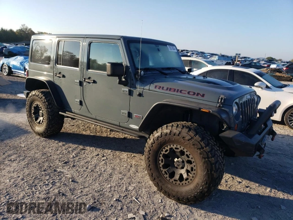 2013 Jeep Wrangler Unlimited Rubicon 10th Anniversary z VIN 1C4HJWFG0DL704100, wystawiony jako Copart lot #75573634 z przebiegiem 103 158 mil mil oraz Szkoda całkowita • Salvage title. Historia ofert i sprzedaży dostępna na DreamBid. Obrazek 4.