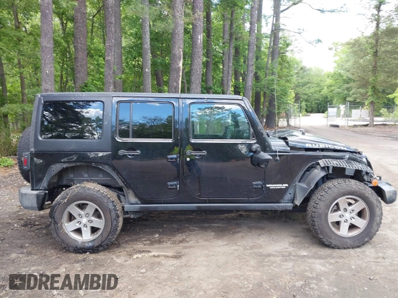 2012 Jeep Wrangler Unlimited Call of Duty MW3 with VIN 1C4BJWFG5CL103267, listed as a IAAI auction lot 42334345 with 135,324 mi miles and . Bid and sale history available at DreamBid. Image 14.