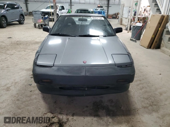 1989 Toyota MR2 z VIN JT2AW15C1K0150268, wystawiony jako Copart lot #86257134 z przebiegiem 93 969 mil mil oraz Tytuł czysty. Historia ofert i sprzedaży dostępna na DreamBid. Obrazek 5.