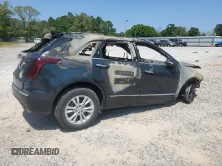 2021 Cadillac XT5 FWD Luxury with VIN 1GYKNAR40MZ144522, listed as a Copart auction lot 53457035 with Not provided miles and Non repairable. Bid and sale history available at DreamBid. Image 3.