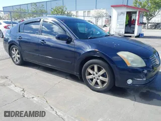 2004 Nissan Maxima SL with VIN 1N4BA41E64C861846, listed as a IAAI auction lot 41911687 with 218,668 mi miles. Bid and sale history available at carsss.com. Image 1.