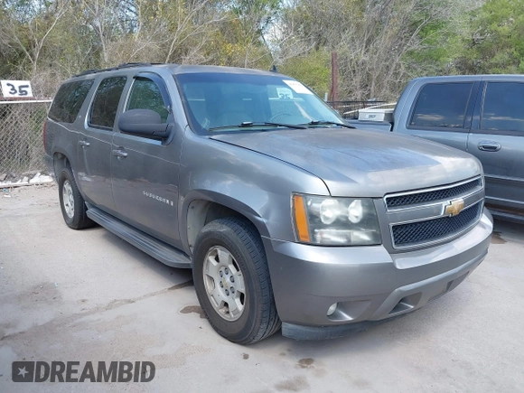 2007 Chevrolet Suburban LT with VIN 1GNFC16017R254537, listed as a IAAI auction lot 41875462 with 150,579 mi miles and . Bid and sale history available at DreamBid. Image 1.