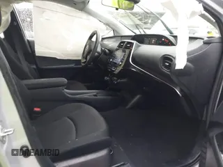 2022 Toyota Prius L Eco with VIN JTDKAMFU1N3177055, listed as a IAAI auction lot 41506862 with 121,318 mi miles and . Bid and sale history available at DreamBid. Image 5.