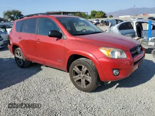 2010 Toyota RAV4 Sport with VIN JTMWF4DVXA5018466, listed as a Copart auction lot 62747385 with 180,769 mi miles and Salvage title. Bid and sale history available at DreamBid. Image 4.