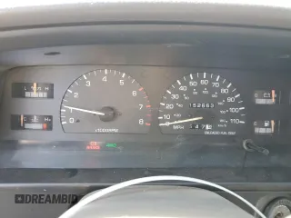 1993 Toyota Pickup DLX z VIN JT4VN13D3P5125406, wystawiony jako Copart lot #75011624 z przebiegiem 152 663 mil mil oraz Szkoda całkowita • Salvage title. Historia ofert i sprzedaży dostępna na DreamBid. Obrazek 9.