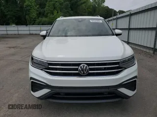2023 Volkswagen Tiguan SE with VIN 3VVNB7AX9PM029204, listed as a Copart auction lot 58340285 with 13,693 mi miles and Salvage title. Bid and sale history available at DreamBid. Image 5.