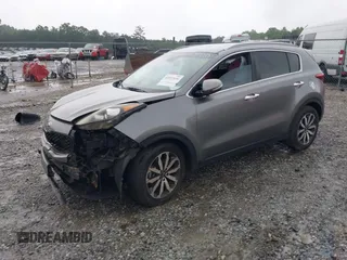 2018 Kia Sportage EX with VIN KNDPN3AC0J7310720, listed as a IAAI auction lot 42400165 with 118,929 mi miles and . Bid and sale history available at DreamBid. Image 2.