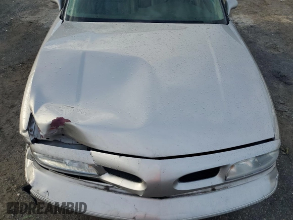 1997 Oldsmobile LSS z VIN 1G3HY52K9V4823565, wystawiony jako Copart lot #73965744 z przebiegiem 74 973 mil mil oraz Szkody całkowita. Historia ofert i sprzedaży dostępna na DreamBid. Obrazek 11.