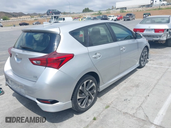 2018 Toyota Corolla iM with VIN JTNKARJE9JJ553578, listed as a IAAI auction lot 42078272 with 63,928 mi miles. Bid and sale history available at carsss.com. Image 4.