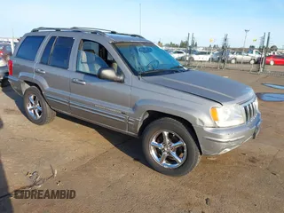 2001 Jeep Grand Cherokee Limited with VIN 1J4GW58N61C670589, listed as a IAAI auction lot 41817712 with 185,905 mi miles. Bid and sale history available at carsss.com. Image 1.