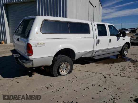 2000 Ford F-350 XL with VIN 1FTSW31F5YEA50810, listed as a Copart auction lot 77443774 with 147,370 mi miles and Salvage Title. Bid and sale history available at DreamBid. Image 3.