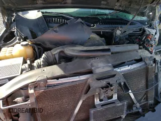 2002 Chevrolet Suburban LT with VIN 1GNFK16T02J261631, listed as a Copart auction lot 46933875 with Not provided miles and Salvage title. Bid and sale history available at DreamBid. Image 12.