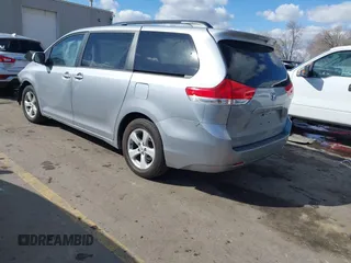 2012 Toyota Sienna LE AAS with VIN 5TDKK3DC1CS264239, listed as a IAAI auction lot 41839022 with 221,769 mi miles. Bid and sale history available at carsss.com. Image 3.