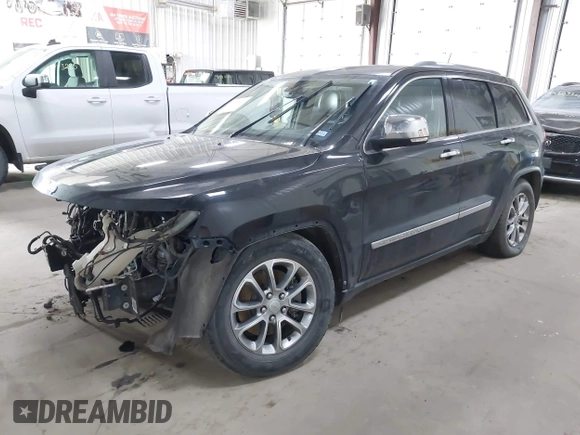 2013 Jeep Grand Cherokee Overland with VIN 1C4RJFCT7DC524005, listed as a IAAI auction lot 42116097 with 126,942 mi miles. Bid and sale history available at carsss.com. Image 2.