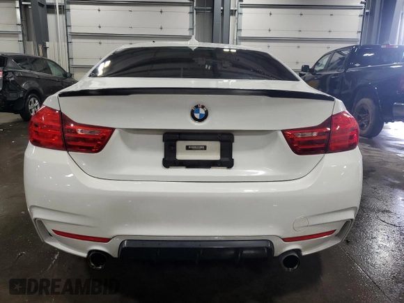2014 BMW 4 Series 435i with VIN WBA3R1C52EK192076, listed as a Copart auction lot 60098595 with 89,504 mi miles and Salvage title. Bid and sale history available at DreamBid. Image 6.