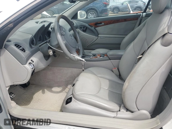 2003 Mercedes-Benz SL 500 with VIN WDBSK75F53F041507, listed as a Copart auction lot 55630925 with 129,451 mi miles and Salvage title. Bid and sale history available at DreamBid. Image 7.