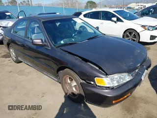 1997 Honda Accord Special Edition with VIN 1HGCD5605VA107036, listed as a IAAI auction lot 41674182 with 236,341 mi miles and . Bid and sale history available at carsss.com. Image 1.