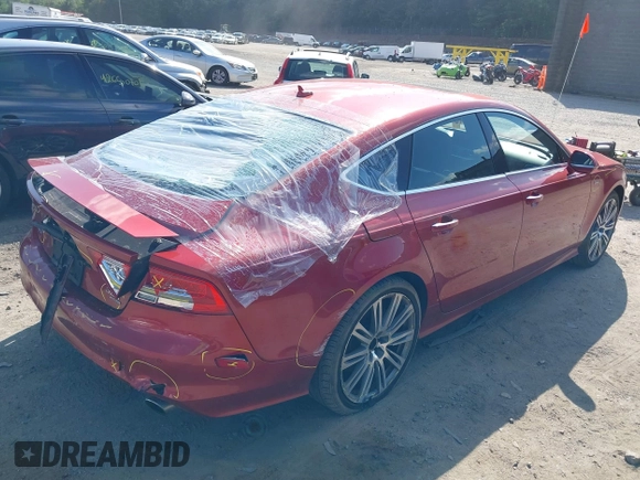 2013 Audi A7 Prestige with VIN WAU2GAFC0DN023439, listed as a IAAI auction lot 42605597 with 173,364 mi miles and . Bid and sale history available at DreamBid. Image 4.