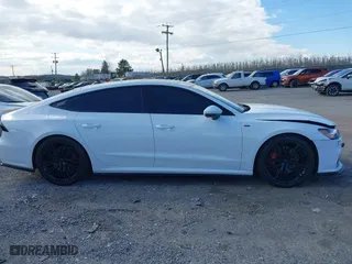 2019 Audi A7 Premium Plus with VIN WAUU2AF27KN116258, listed as a IAAI auction lot 41884777 with 56,871 mi miles. Bid and sale history available at carsss.com. Image 13.