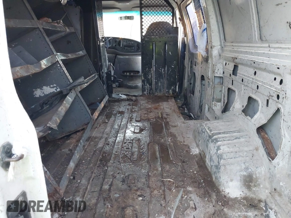 1999 Ford Econoline Cargo Commercial with VIN 1FTNE24L3XHB84868, listed as a IAAI auction lot 41151145 with 450,651 mi miles and . Bid and sale history available at carsss.com. Image 8.