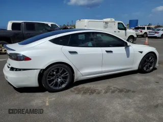 2021 Tesla Model S Plaid с VIN 5YJSA1E66MF453717, выставлен на аукционе Copart как лот 49330355 с пробегом 64 458 миль миль и Списание • Salvage title. История ставок и продаж доступна на DreamBid. Изображение 3.