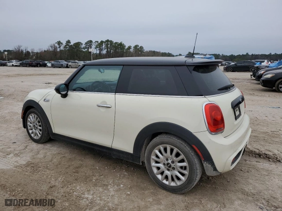 2014 MINI Cooper Hardtop S with VIN WMWXM7C51ET985656, listed as a Copart auction lot 45526335 with 106,244 mi miles and Salvage Title. Bid and sale history available at carsss.com. Image 2.