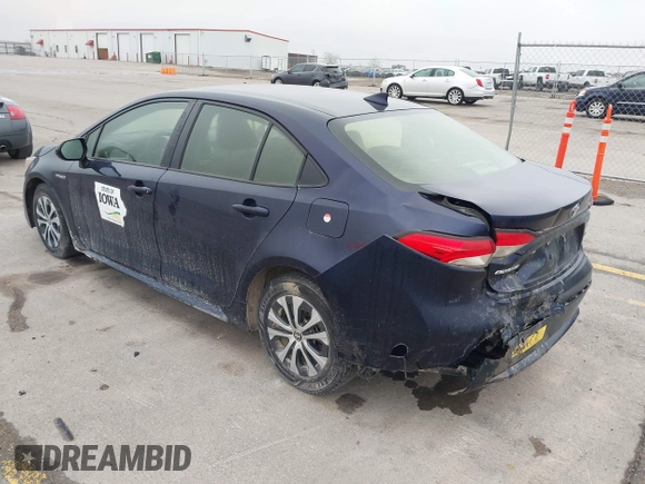 2021 Toyota Corolla Hybrid LE with VIN JTDEAMDE9MJ003172, listed as a IAAI auction lot 42062851 with 96,753 mi miles. Bid and sale history available at carsss.com. Image 18.