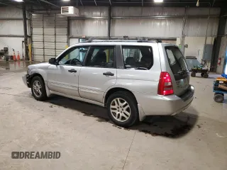 2003 Subaru Forester XS with VIN JF1SG65673H714885, listed as a Copart auction lot 74063684 with 298,649 mi miles and Salvage Title. Bid and sale history available at carsss.com. Image 2.