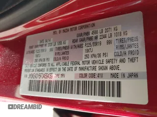 2015 Mazda CX-5 Grand Touring with VIN JM3KE4DY5F0469439, listed as a IAAI auction lot 42053851 with 70,676 mi miles. Bid and sale history available at carsss.com. Image 9.