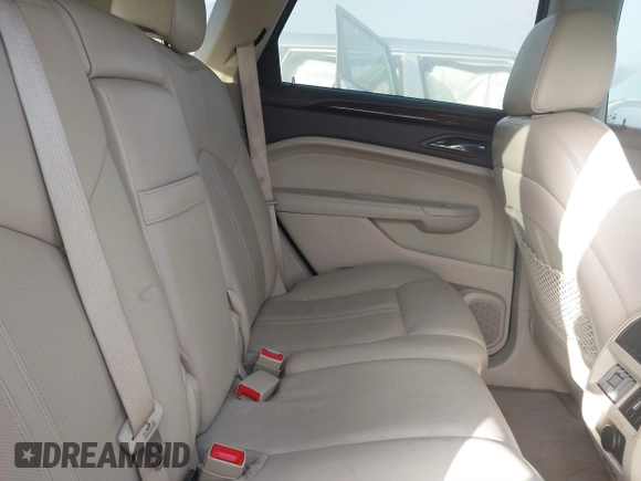 2011 Cadillac SRX Luxury Collection with VIN 3GYFNAEY2BS572385, listed as a IAAI auction lot 41138772 with 132,706 mi miles and . Bid and sale history available at DreamBid. Image 8.
