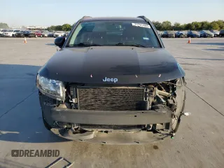 2015 Jeep Compass Latitude with VIN 1C4NJCEBXFD131484, listed as a Copart auction lot 74731464 with 76,048 mi miles and Salvage Title. Bid and sale history available at carsss.com. Image 5.