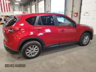 2016 Mazda CX-5 Touring z VIN JM3KE4CY7G0898598, wystawiony jako Copart lot #56717895 z przebiegiem 103 548 mil mil oraz Szkoda całkowita • Salvage title. Historia ofert i sprzedaży dostępna na DreamBid. Obrazek 3.