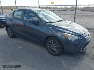2019 Toyota Yaris Sedan L with VIN 3MYDLBYV2KY503513, listed as a IAAI auction lot 38703904 with 68,910 mi miles. Bid and sale history available at carsss.com. Image 1.