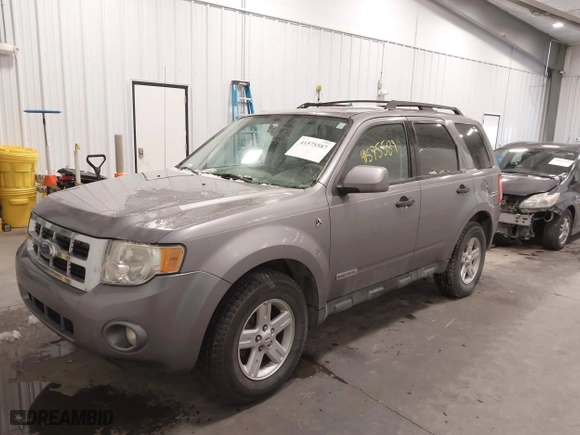 2008 Ford Escape Hybrid with VIN 1FMCU59H18KC30939, listed as a IAAI auction lot 41575587 with 208,879 mi miles. Bid and sale history available at carsss.com. Image 2.