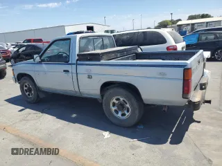 1987 Nissan Hardbody E z VIN JN6ND11S1HW030629, wystawiony jako Copart lot #65657004 z przebiegiem 181 228 mil mil oraz Szkody całkowita. Historia ofert i sprzedaży dostępna na DreamBid. Obrazek 2.