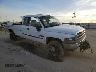 2001 Dodge Ram 2500 with VIN 3B7KF236X1G750022, listed as a Copart auction lot 85817554 with 138,699 mi miles and Salvage Title. Bid and sale history available at carsss.com. Image 4.