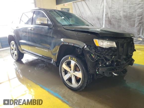 2015 Jeep Grand Cherokee Overland with VIN 1C4RJFCG8FC653117, listed as a Copart auction lot 49254595 with 142,359 mi miles and Clean Title. Bid and sale history available at carsss.com. Image 4.