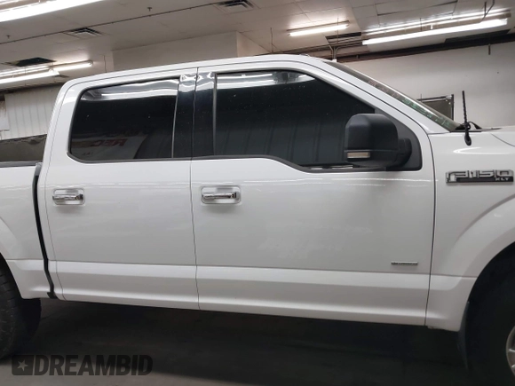 2015 Ford F-150 XLT with VIN 1FTEW1EGXFFB84269, listed as a IAAI auction lot 42565801 with 140,719 mi miles and . Bid and sale history available at DreamBid. Image 13.