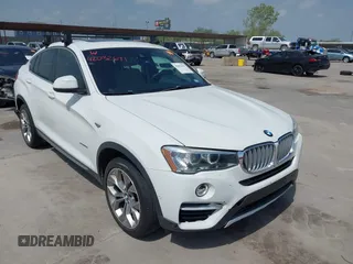 2018 BMW X4 xDrive28i z VIN 5UXXW3C52J0T82067, wystawiony jako IAAI lot #42032671 z przebiegiem 101 331 mil mil oraz . Historia ofert i sprzedaży dostępna na DreamBid. Obrazek 1.