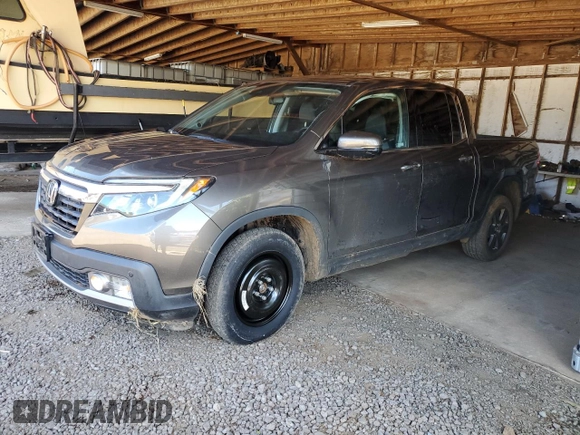 2020 Honda Ridgeline RTL-E z VIN 5FPYK3F74LB004391, wystawiony jako Copart lot #50100715 z przebiegiem 27 076 mil mil oraz Szkoda całkowita • Salvage title. Historia ofert i sprzedaży dostępna na DreamBid. Obrazek 1.