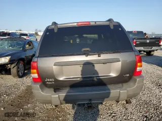 2002 Jeep Grand Cherokee Laredo with VIN 1J4GW48N32C180185, listed as a Copart auction lot 51988335 with 212,399 mi miles and Salvage Title. Bid and sale history available at carsss.com. Image 7.