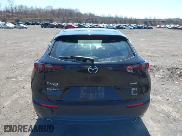 2021 Mazda CX-30 S with VIN 3MVDMBAL3MM214735, listed as a IAAI auction lot 42000096 with 46,794 mi miles and . Bid and sale history available at DreamBid. Image 16.