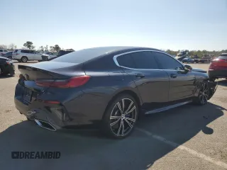 2020 BMW 8 Series M850i with VIN WBAGV8C02LCE34594, listed as a Copart auction lot 50389675 with 37,279 mi miles and Salvage title. Bid and sale history available at DreamBid. Image 3.